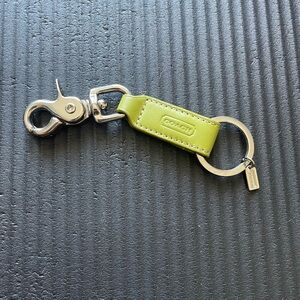 NWOT Coach keychain silver green excellent condition leather.